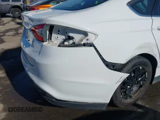2014 Ford Fusion S with VIN 1FA6P0G79E5383039, listed as a IAAI auction lot 42037262 with 192,400 mi miles and . Bid and sale history available at DreamBid. Image 19.