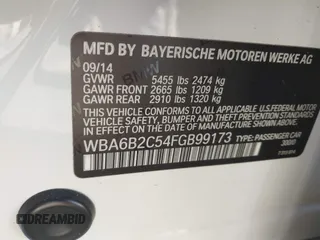 2015 BMW 6 Series 650i with VIN WBA6B2C54FGB99173, listed as a IAAI auction lot 41692594 with 123,664 mi miles and . Bid and sale history available at carsss.com. Image 9.