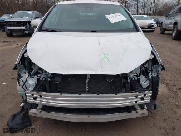 2021 Toyota Prius L Eco with VIN JTDKAMFU1M3149867, listed as a IAAI auction lot 41417036 with 84,421 mi miles. Bid and sale history available at carsss.com. Image 6.