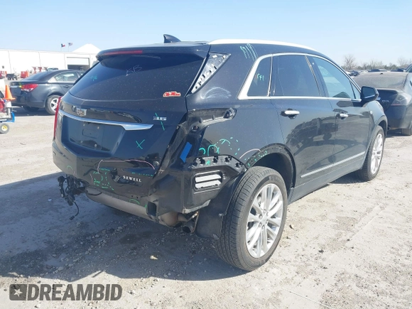 2017 Cadillac XT5 Platinum AWD z VIN 1GYKNFRS7HZ103127, wystawiony jako IAAI lot #41830037 z przebiegiem 82 480 mil mil oraz . Historia ofert i sprzedaży dostępna na DreamBid. Obrazek 4.