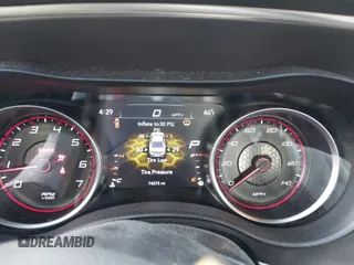 2019 Dodge Charger SXT with VIN 2C3CDXJG3KH630975, listed as a IAAI auction lot 41580174 with 74,575 mi miles and . Bid and sale history available at DreamBid. Image 7.