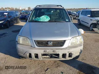1999 Honda CR-V LX with VIN JHLRD284XXC019021, listed as a IAAI auction lot 41031098 with 204,206 mi miles. Bid and sale history available at carsss.com. Image 12.