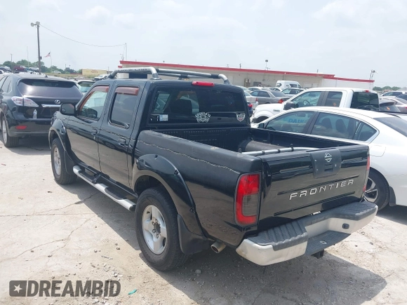 2001 Nissan Frontier SE with VIN 1N6ED27T81C305653, listed as a IAAI auction lot 42260643 with 245,547 mi miles and . Bid and sale history available at DreamBid. Image 3.