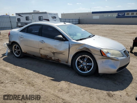 2005 Pontiac G6 GT with VIN 1G2ZH528X54145535, listed as a Copart auction lot 60499995 with 197,731 mi miles and Salvage title. Bid and sale history available at DreamBid. Image 4.