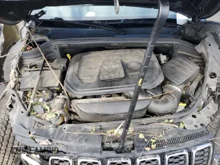 2019 Jeep Grand Cherokee Altitude with VIN 1C4RJFAG5KC591141, listed as a Copart auction lot 56885105 with 88,000 mi miles and Salvage title. Bid and sale history available at DreamBid. Image 12.
