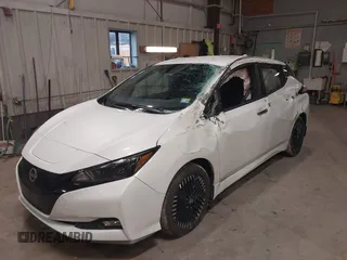2023 Nissan LEAF SV Plus z VIN 1N4CZ1CV0PC563256, wystawiony jako IAAI lot #41138436 z przebiegiem 24 399 mil mil oraz . Historia ofert i sprzedaży dostępna na DreamBid. Obrazek 6.