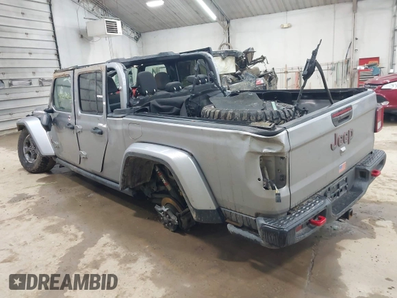 2020 Jeep Gladiator Rubicon with VIN 1C6JJTBGXLL136627, listed as a IAAI auction lot 42333468 with 74,717 mi miles and . Bid and sale history available at DreamBid. Image 3.