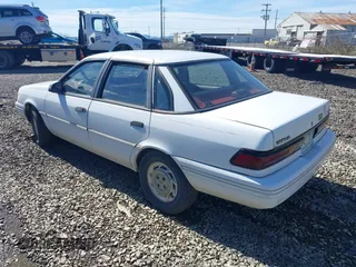 1993 Ford Tempo z VIN 1FAPP36X7PK153107, wystawiony jako IAAI lot #41867198 z przebiegiem 9377 mil mil oraz . Historia ofert i sprzedaży dostępna na DreamBid. Obrazek 3.
