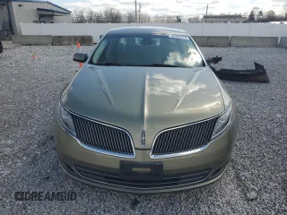 2013 Lincoln MKS with VIN 1LNHL9DKXDG617490, listed as a Copart auction lot 52282775 with 106,663 mi miles and Salvage Title. Bid and sale history available at carsss.com. Image 5.