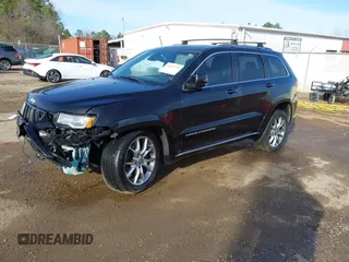 2015 Jeep Grand Cherokee Summit with VIN 1C4RJFJMXFC878812, listed as a IAAI auction lot 41637279 with 149,488 mi miles. Bid and sale history available at carsss.com. Image 18.