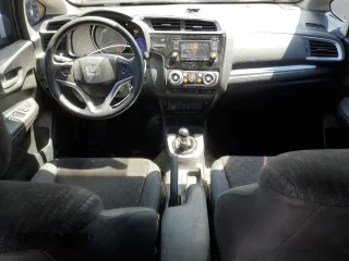 2015 Honda Fit LX с VIN 3HGGK5G59FM723604, выставлен на аукционе Copart как лот 58594315 с пробегом 137 251 миль миль и Чистый • Clean title. История ставок и продаж доступна на DreamBid. Изображение 8.
