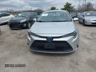2020 Toyota Corolla Hybrid LE with VIN JTDEBRBE1LJ008409, listed as a IAAI auction lot 41948940 with 102,402 mi miles. Bid and sale history available at carsss.com. Image 12.