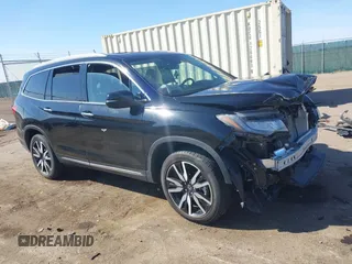 2021 Honda Pilot Touring 8-Passenger z VIN 5FNYF6H98MB090559, wystawiony jako IAAI lot #41775495 z przebiegiem 60 478 mil mil oraz . Historia ofert i sprzedaży dostępna na DreamBid. Obrazek 1.