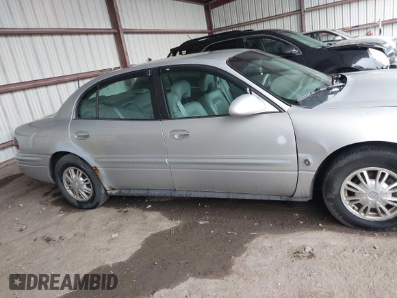 2003 Buick LeSabre Limited z VIN 1G4HR54K13U209094, wystawiony jako IAAI lot #42572460 z przebiegiem 102 970 mil mil oraz . Historia ofert i sprzedaży dostępna na DreamBid. Obrazek 13.
