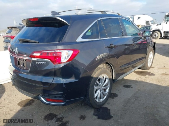 2016 Acura RDX with VIN 5J8TB3H32GL014192, listed as a IAAI auction lot 41418387 with 101,305 mi miles. Bid and sale history available at carsss.com. Image 4.