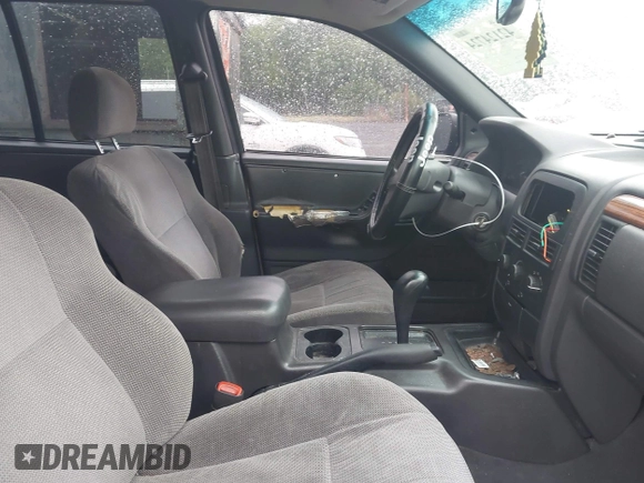 1999 Jeep Grand Cherokee Laredo with VIN 1J4G258SXXC518647, listed as a IAAI auction lot 42124724 with 229,668 mi miles and . Bid and sale history available at DreamBid. Image 5.