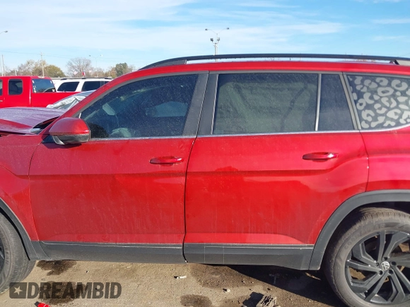 2023 Volkswagen Atlas SE z VIN 1V2JR2CA0PC538697, wystawiony jako IAAI lot #41347126 z przebiegiem 28 310 mil mil oraz . Historia ofert i sprzedaży dostępna na DreamBid. Obrazek 14.