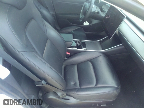 2020 Tesla Model 3 Standard Range Plus with VIN 5YJ3E1EA0LF597839, listed as a IAAI auction lot 41639219 with 49,220 mi miles. Bid and sale history available at carsss.com. Image 5.