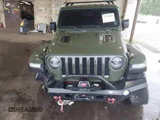 2021 Jeep Wrangler Unlimited Rubicon with VIN 1C4HJXFG4MW543254, listed as a IAAI auction lot 42316180 with 50,696 mi miles and . Bid and sale history available at DreamBid. Image 12.