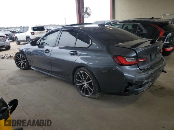 2022 BMW 3 Series 330i with VIN 3MW5R1J0XN8C22443, listed as a Copart auction lot 46816985 with 102,014 mi miles and Clean Title. Bid and sale history available at carsss.com. Image 2.