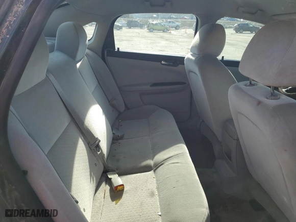 2015 Chevrolet Impala Limited LS with VIN 2G1WA5E34F1145118, listed as a Copart auction lot 89339935 with 134,638 mi miles and Salvage Title. Bid and sale history available at carsss.com. Image 10.