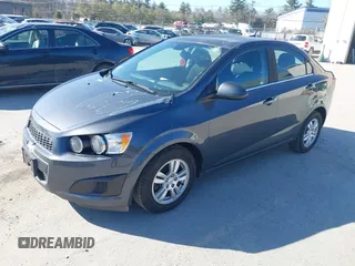 2013 Chevrolet Sonic LT with VIN 1G1JC5SG5D4135971, listed as a IAAI auction lot 41762168 with 140,493 mi miles and . Bid and sale history available at DreamBid. Image 2.