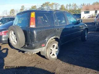 1999 Honda CR-V LX with VIN JHLRD1847XC000212, listed as a IAAI auction lot 41699221 with 109,093 mi miles. Bid and sale history available at carsss.com. Image 4.