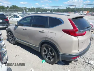 2018 Honda CR-V Touring with VIN 5J6RW1H98JL000031, listed as a IAAI auction lot 40605651 with 129,516 mi miles and . Bid and sale history available at DreamBid. Image 13.