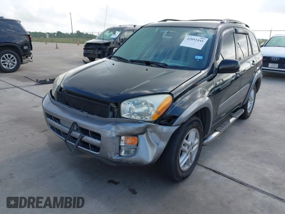 2001 Toyota RAV4 with VIN JTEGH20V910029962, listed as a IAAI auction lot 42092441 with 148,966 mi miles and . Bid and sale history available at DreamBid. Image 6.