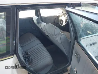 1989 Chevrolet Celebrity z VIN 1G1AW81W1K6142189, wystawiony jako IAAI lot #41816143 z przebiegiem 141 081 mil mil oraz . Historia ofert i sprzedaży dostępna na DreamBid. Obrazek 8.