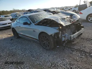 2021 Ford Mustang Mach 1 with VIN 1FA6P8R06M5551345, listed as a Copart auction lot 86491604 with 7,374 mi miles and Salvage Title. Bid and sale history available at carsss.com. Image 4.