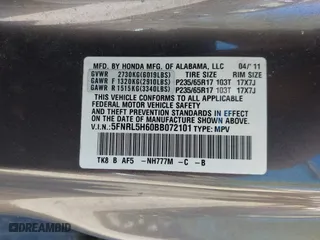 2011 Honda Odyssey EX-L with VIN 5FNRL5H60BB072101, listed as a IAAI auction lot 42002097 with 243,607 mi miles. Bid and sale history available at carsss.com. Image 9.