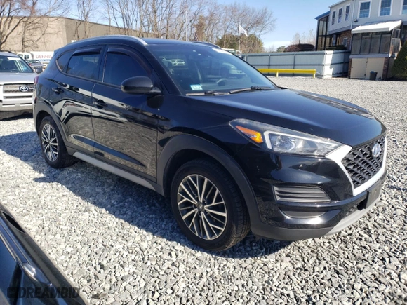 2019 Hyundai Tucson SEL with VIN KM8J3CAL1KU028144, listed as a Copart auction lot 50598075 with 84,543 mi miles and Salvage Title. Bid and sale history available at carsss.com. Image 4.
