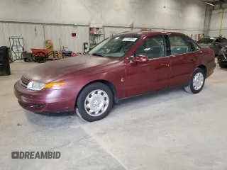 2001 Saturn LS z VIN 1G8JU52F51Y549021, wystawiony jako Copart lot #81109084 z przebiegiem 14 974 mil mil oraz Tytuł czysty. Historia ofert i sprzedaży dostępna na DreamBid. Obrazek 1.