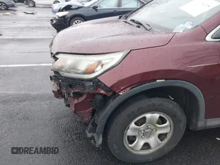 2015 Honda CR-V LX with VIN 2HKRM4H37FH695347, listed as a IAAI auction lot 41124018 with 117,400 mi miles and . Bid and sale history available at carsss.com. Image 6.