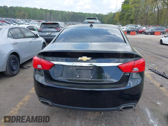 2014 Chevrolet Impala LTZ with VIN 1G1155S32EU155880, listed as a IAAI auction lot 41964572 with 184,992 mi miles and . Bid and sale history available at DreamBid. Image 16.