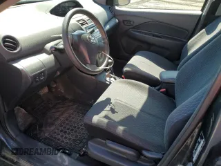2012 Toyota Yaris with VIN JTDBT4K36CL028550, listed as a Copart auction lot 52071475 with 173,922 mi miles and Salvage Title. Bid and sale history available at DreamBid. Image 7.