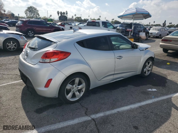 2014 Hyundai Veloster with VIN KMHTC6AD2EU186726, listed as a Copart auction lot 43993215 with 120,591 mi miles and Salvage Title. Bid and sale history available at carsss.com. Image 3.