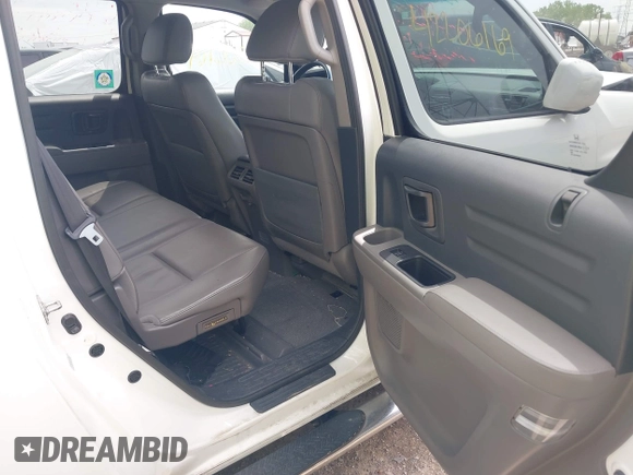 2012 Honda Ridgeline RTL with VIN 5FPYK1F57CB453096, listed as a IAAI auction lot 42206169 with 82,846 mi miles and . Bid and sale history available at DreamBid. Image 8.