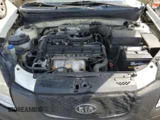 2009 Kia Rio LX with VIN KNADE223X96439445, listed as a Copart auction lot 54619335 with 102,120 mi miles and Salvage Title. Bid and sale history available at DreamBid. Image 11.