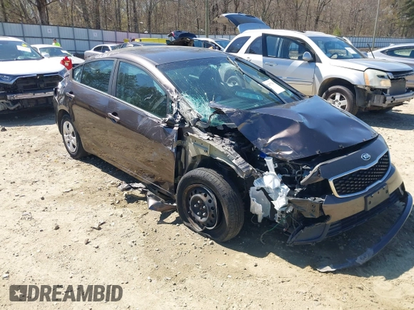 2018 Kia Forte LX with VIN 3KPFL4A71JE201144, listed as a IAAI auction lot 41874778 with 100,980 mi miles. Bid and sale history available at carsss.com. Image 1.