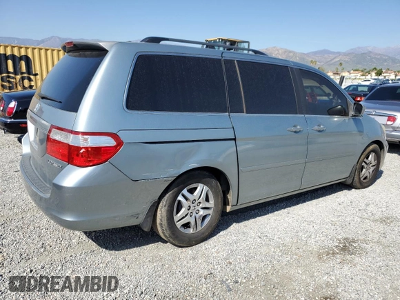 2005 Honda Odyssey EX with VIN 5FNRL38405B099581, listed as a Copart auction lot 52970815 with 218,225 mi miles and Salvage Title. Bid and sale history available at carsss.com. Image 3.