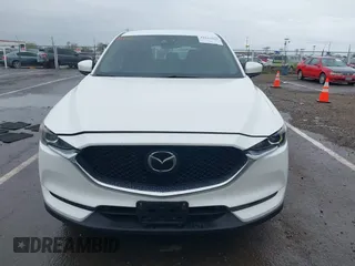 2020 Mazda CX-5 Touring with VIN JM3KFACM0L0738615, listed as a IAAI auction lot 41923923 with 52,599 mi miles. Bid and sale history available at carsss.com. Image 13.