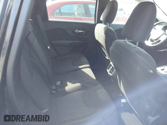 2015 Jeep Cherokee North with VIN 1C4PJMCS4FW792918, listed as a IAAI auction lot 41748651 with 107,034 mi miles. Bid and sale history available at carsss.com. Image 8.