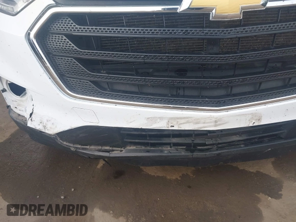 2021 Chevrolet Traverse LS z VIN 1GNERFKW5MJ197111, wystawiony jako IAAI lot #42056277 z przebiegiem 64 771 mil mil oraz . Historia ofert i sprzedaży dostępna na DreamBid. Obrazek 6.