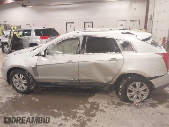 2016 Cadillac SRX Luxury Collection z VIN 3GYFNBE36GS572780, wystawiony jako IAAI lot #41347399 z przebiegiem 166 436 mil mil oraz . Historia ofert i sprzedaży dostępna na DreamBid. Obrazek 14.