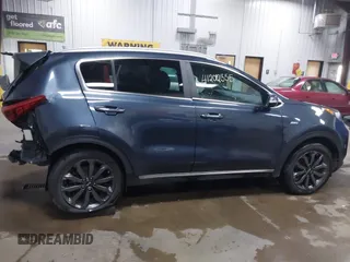 2019 Kia Sportage EX z VIN KNDPNCAC0K7575087, wystawiony jako IAAI lot #41202355 z przebiegiem 31 768 mil mil oraz . Historia ofert i sprzedaży dostępna na DreamBid. Obrazek 13.