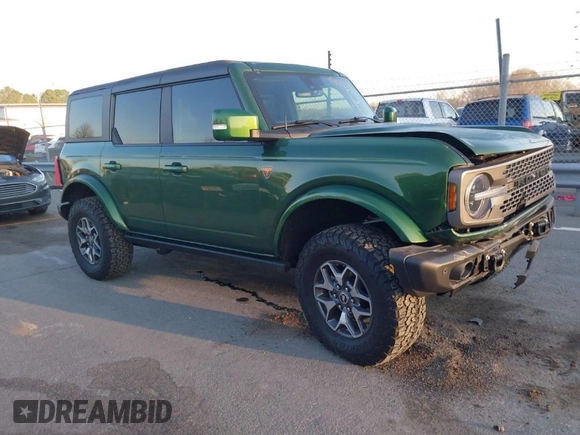 2023 Ford Bronco z VIN 1FMEE5DP2PLB43810, wystawiony jako IAAI lot #41656885 z przebiegiem 22 178 mil mil oraz . Historia ofert i sprzedaży dostępna na DreamBid. Obrazek 1.