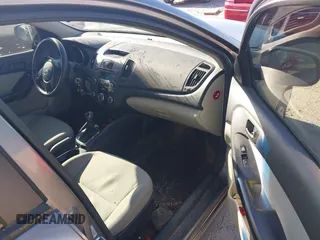 2012 Kia Forte EX with VIN KNAFU4A24C5560114, listed as a IAAI auction lot 41669309 with 236,464 mi miles. Bid and sale history available at carsss.com. Image 5.