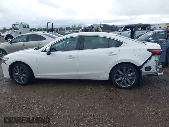 2021 Mazda 6 Touring with VIN JM1GL1VM7M1611070, listed as a IAAI auction lot 41755673 with 46,288 mi miles and . Bid and sale history available at carsss.com. Image 14.